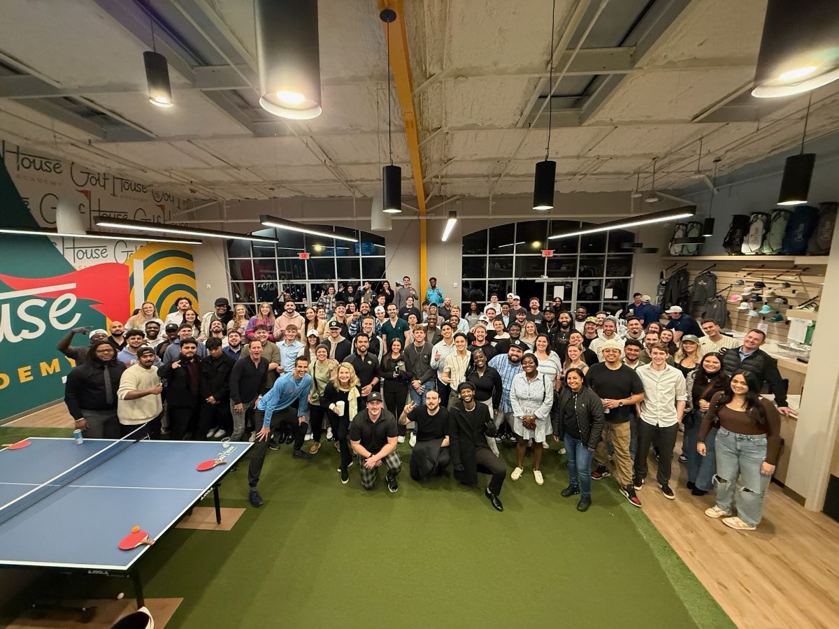 Corporate group event at Golf House Academy indoor golf facility in Atlanta