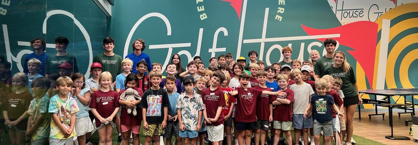 A big group of kids at a Golf House Academy golf camp in Atlanta