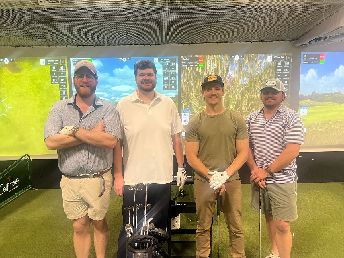 Golfers at a Golf House Academy social league night in Atlanta