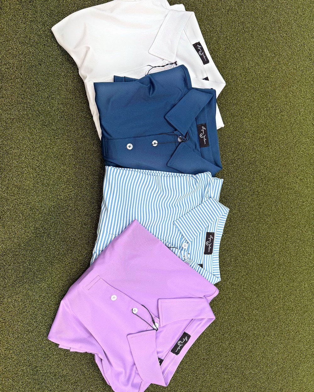 GHA Pin Flag polos in white, navy, light blue stripe and lavender